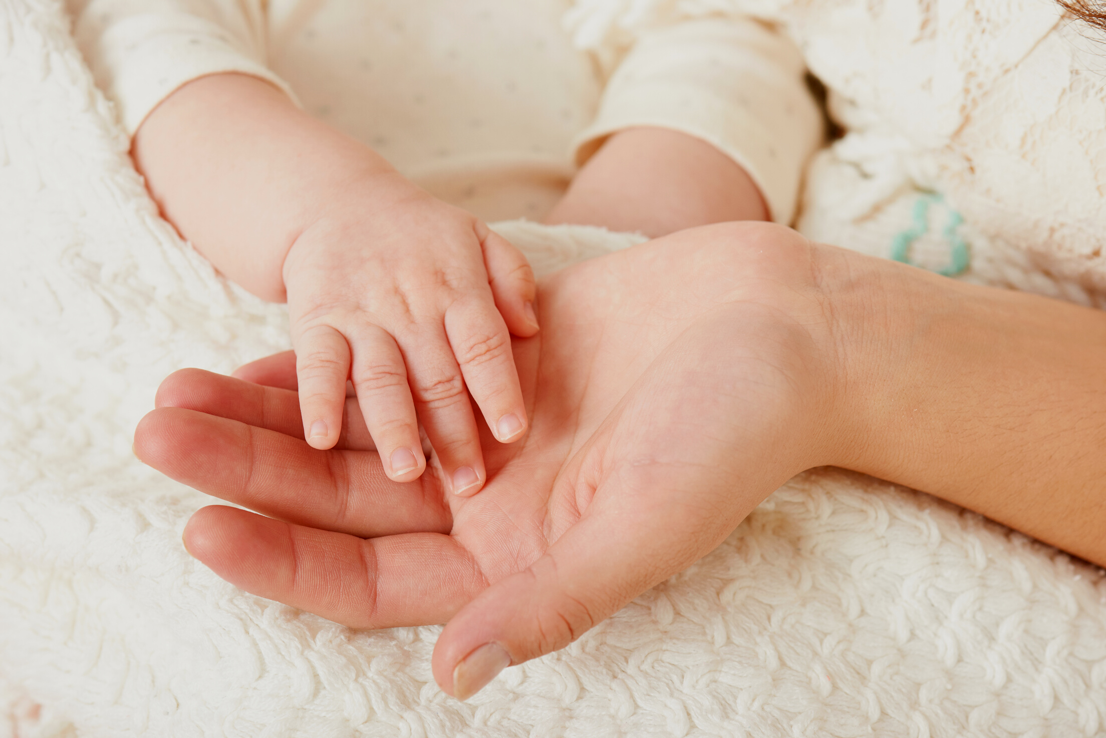 mother with sleeping baby portrait, happy maternity concept